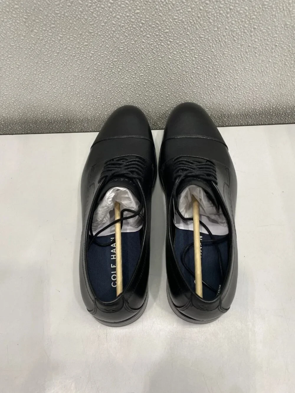 Cole Haan features please tags
